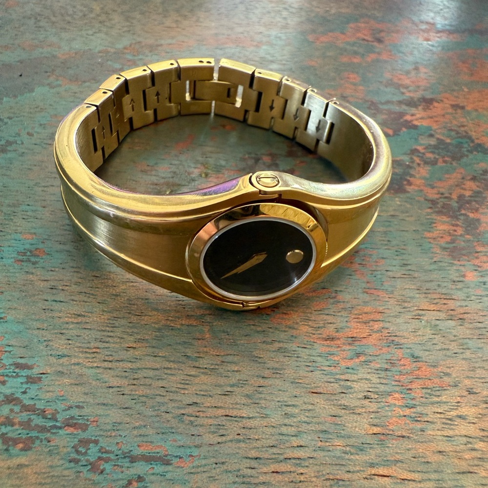 Movado Gold Watch with Black Dial